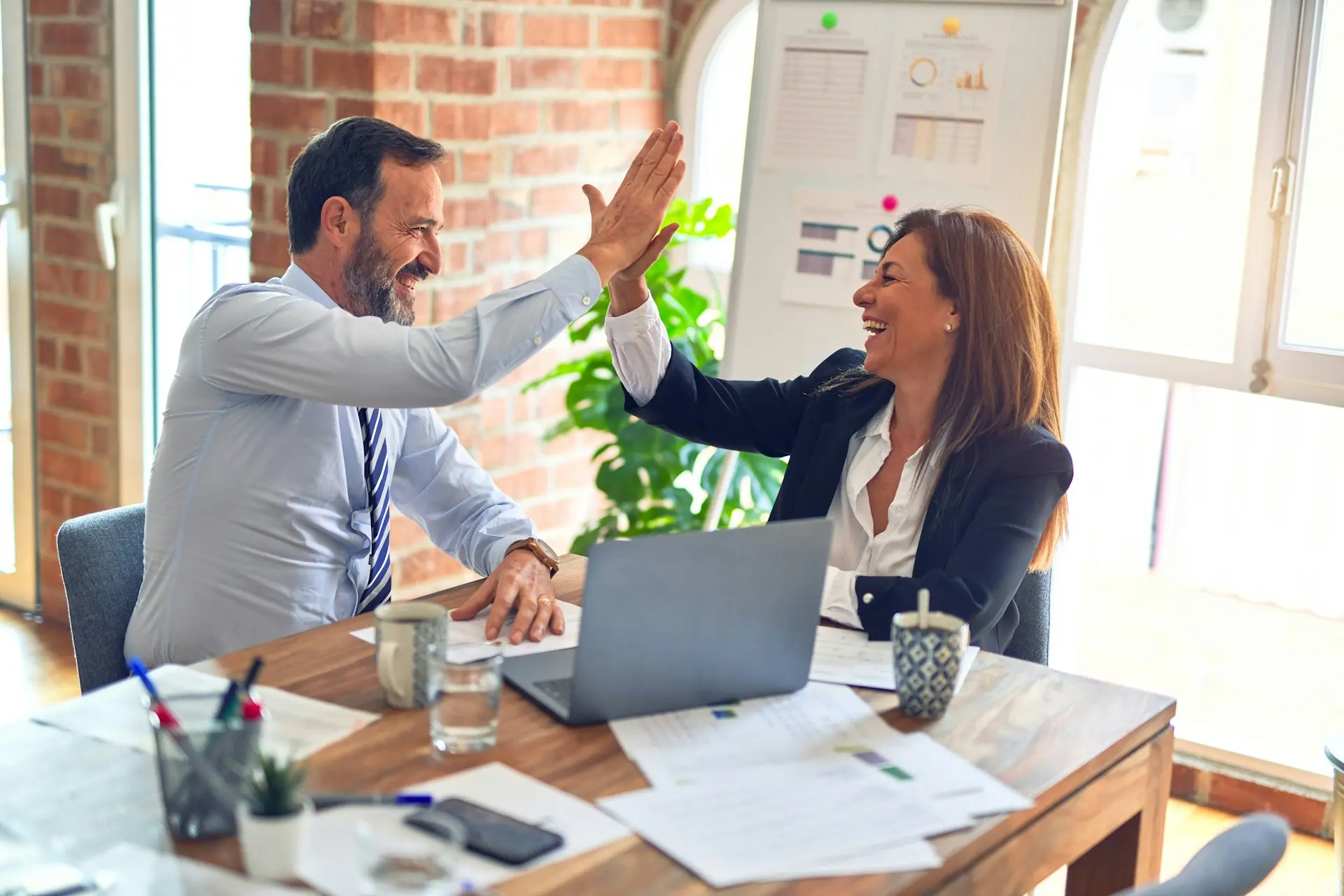 Revenue leaders reviewing quarterly performance with data-driven insights